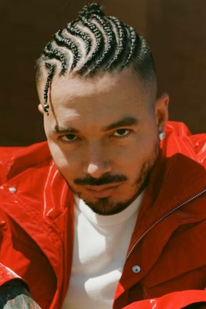 J Balvin Hair in a braided manbun